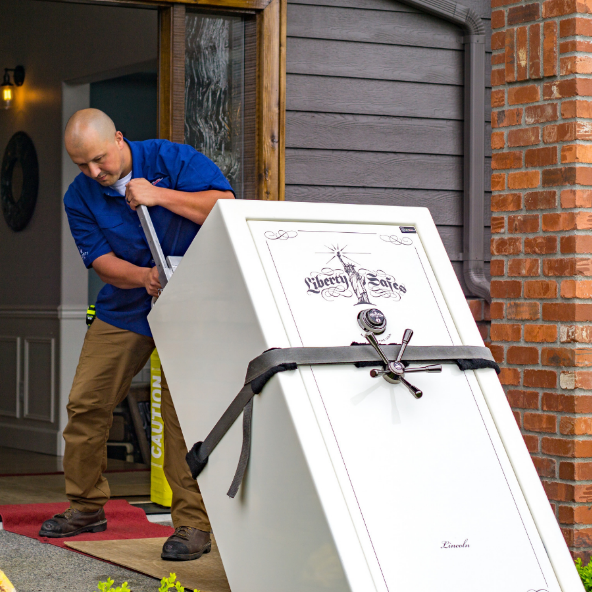 Man delivering safe.